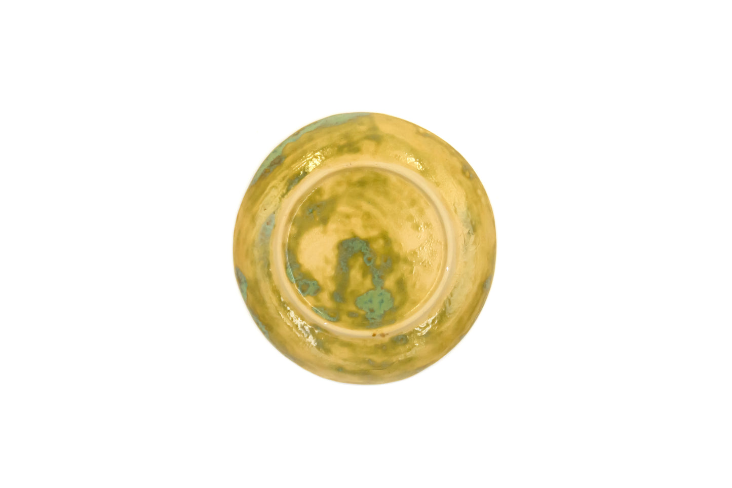 Assiette en céramique beige et verte