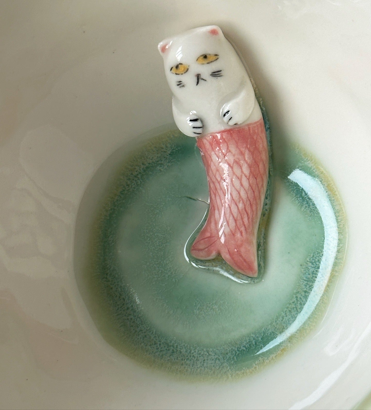 Filiżanka porcelanowa z syrenkotką