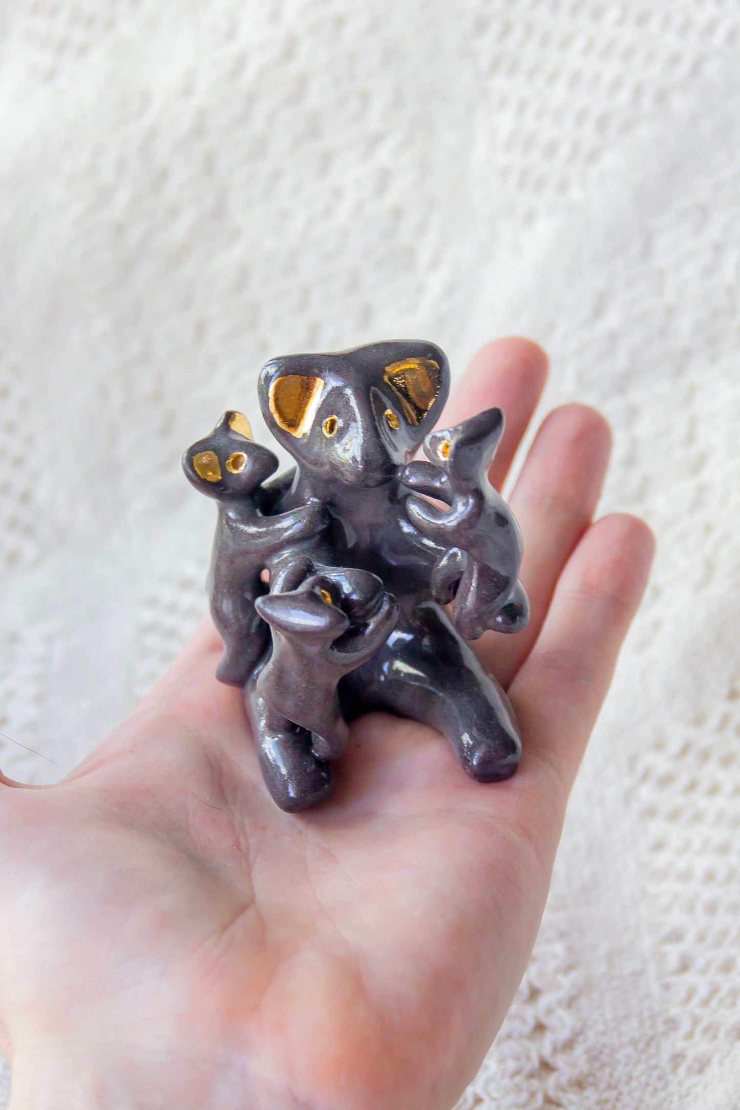 Grande Famille Werling, sculpture en porcelaine avec dorure
