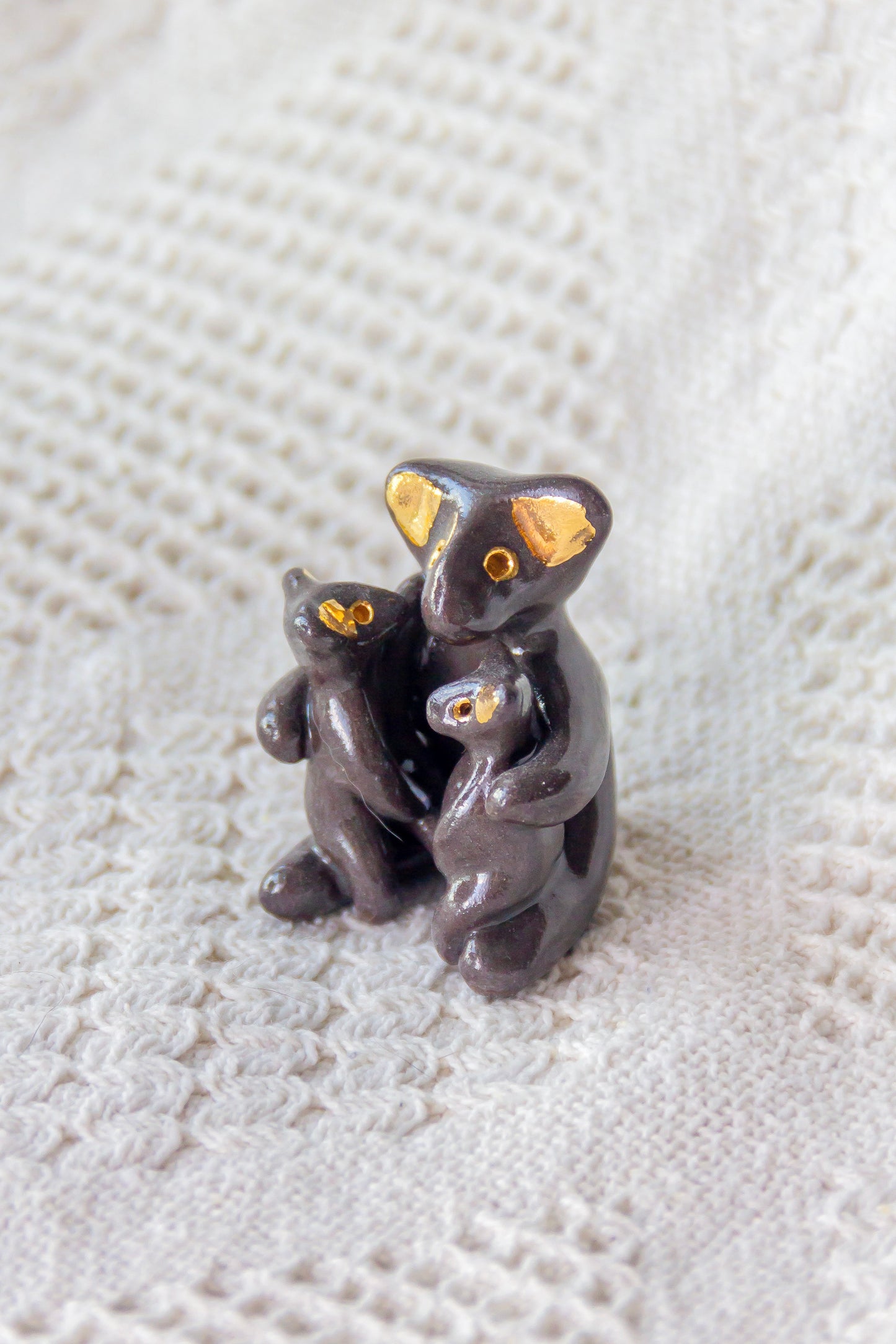 Grande Famille Werling, sculpture en porcelaine avec dorure