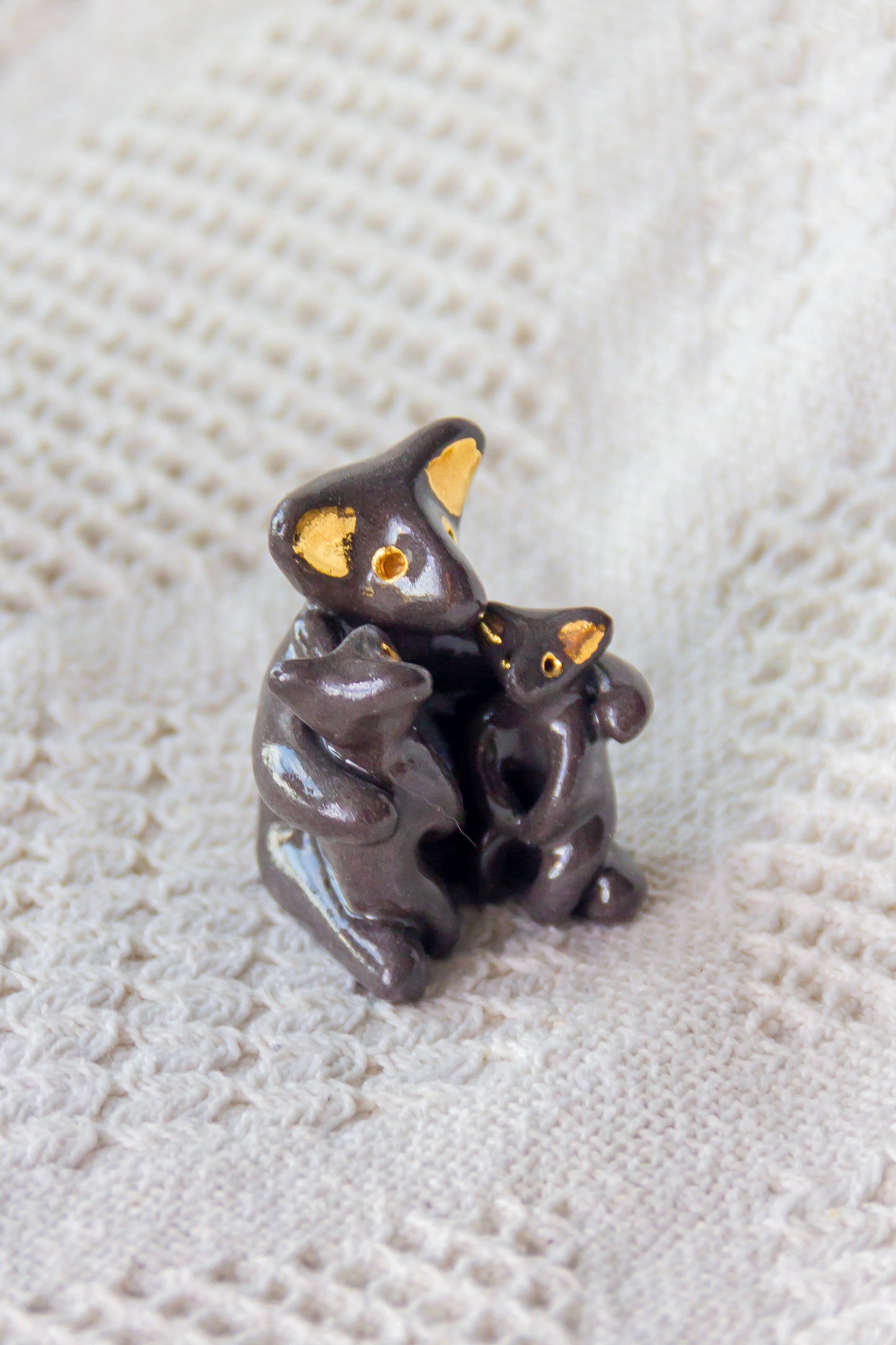 Grande Famille Werling, sculpture en porcelaine avec dorure