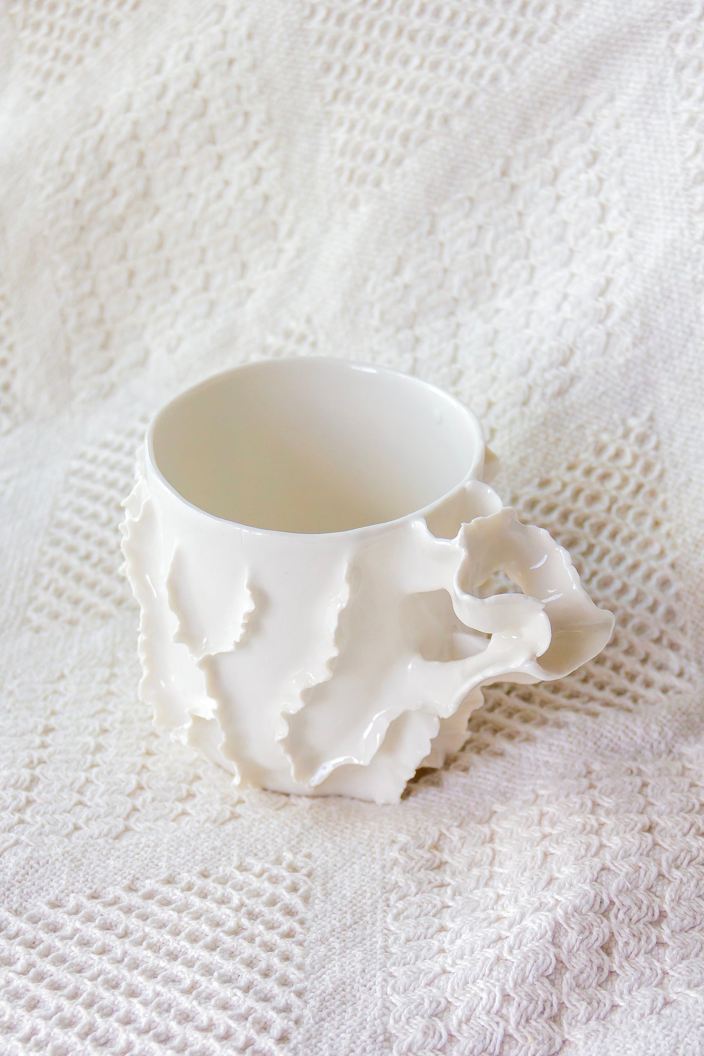 Kubek porcelanowy „Laminari” biały