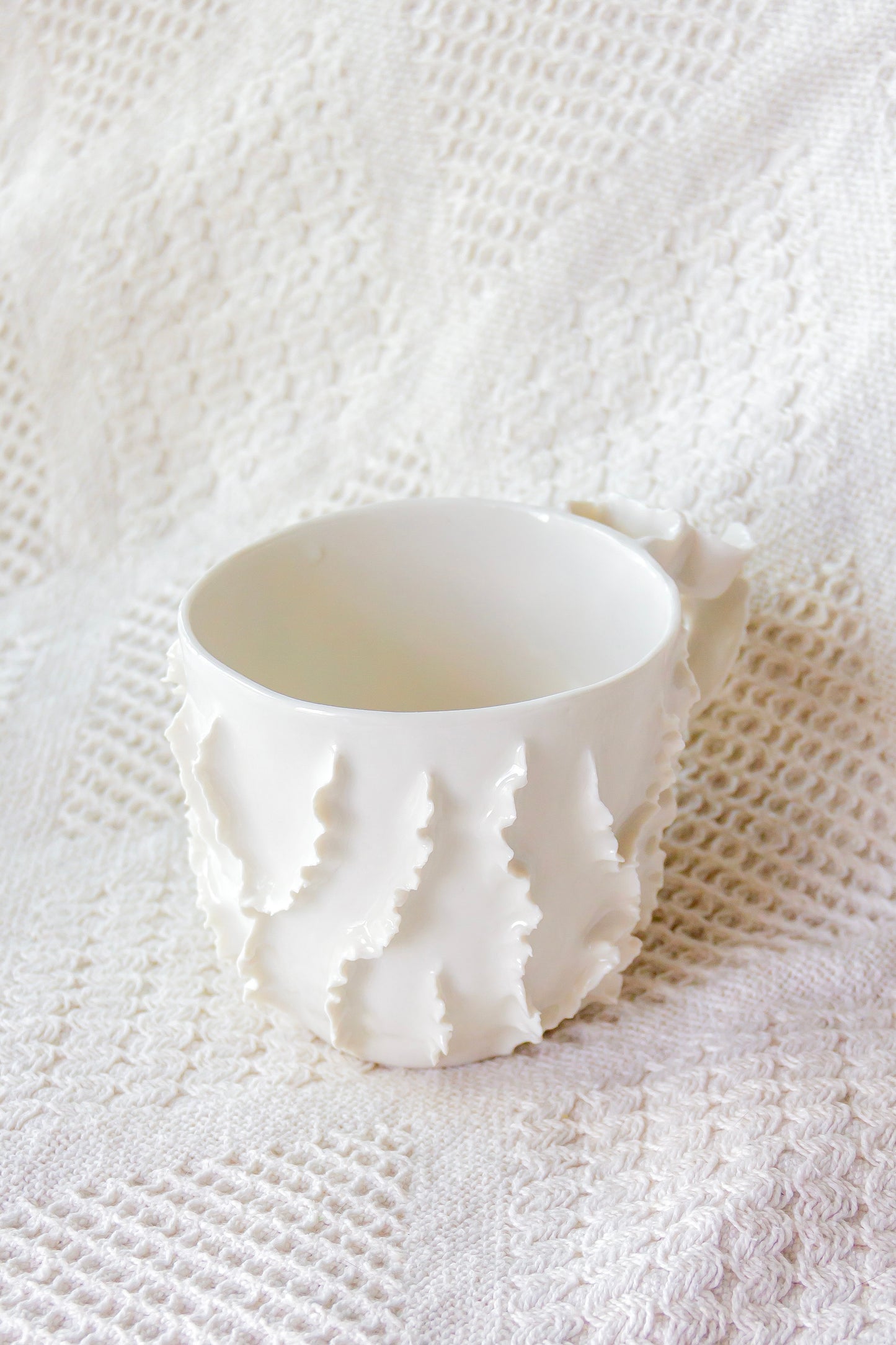 Kubek porcelanowy „Laminari” biały