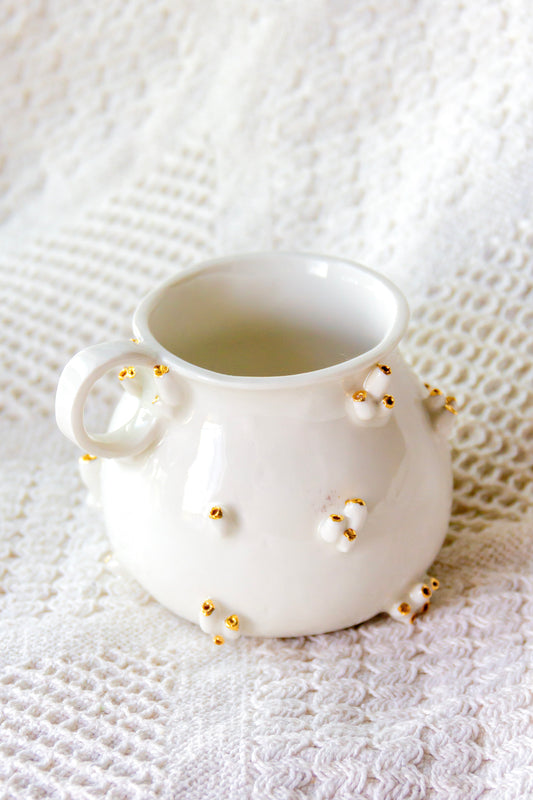 Kubek porcelanowy «Ascydia» biały ze złoceniem