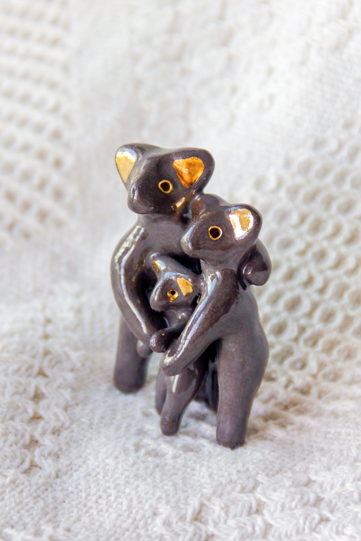 Grande Famille Werling, sculpture en porcelaine avec dorure