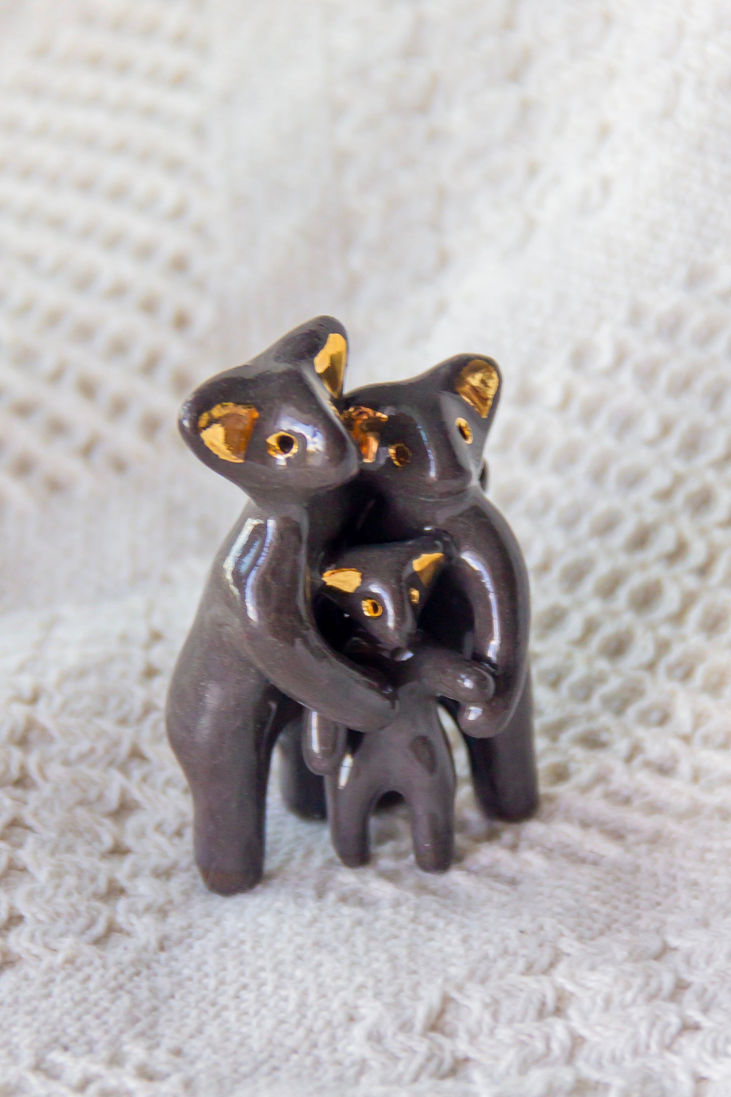 Grande Famille Werling, sculpture en porcelaine avec dorure