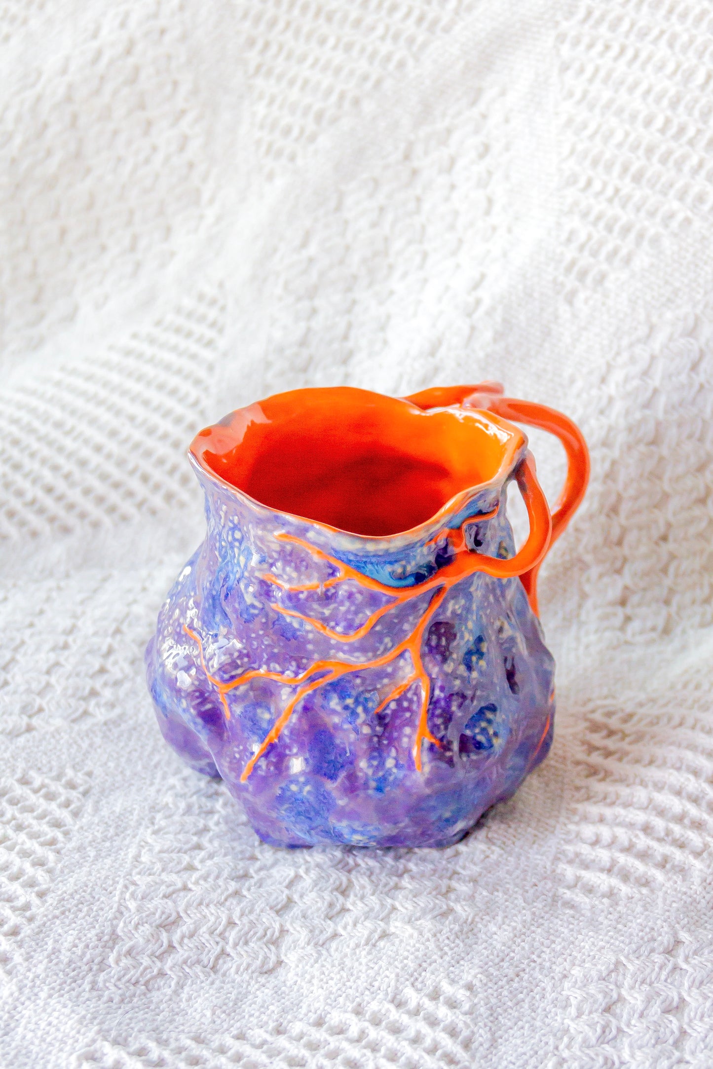 Kubek ceramiczny “Couroupita” fioletowo-pomarańczowy