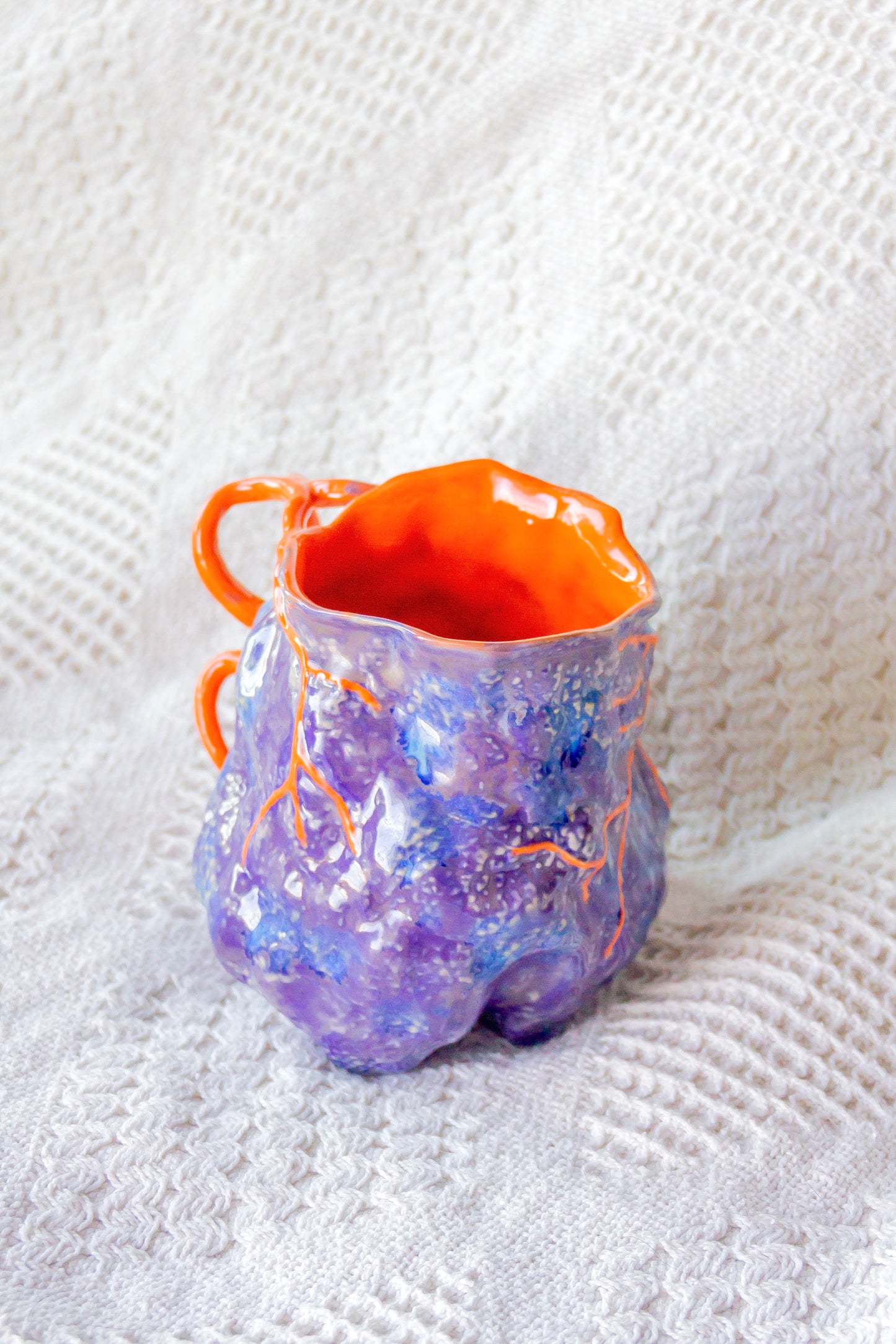 Kubek ceramiczny “Couroupita” fioletowo-pomarańczowy