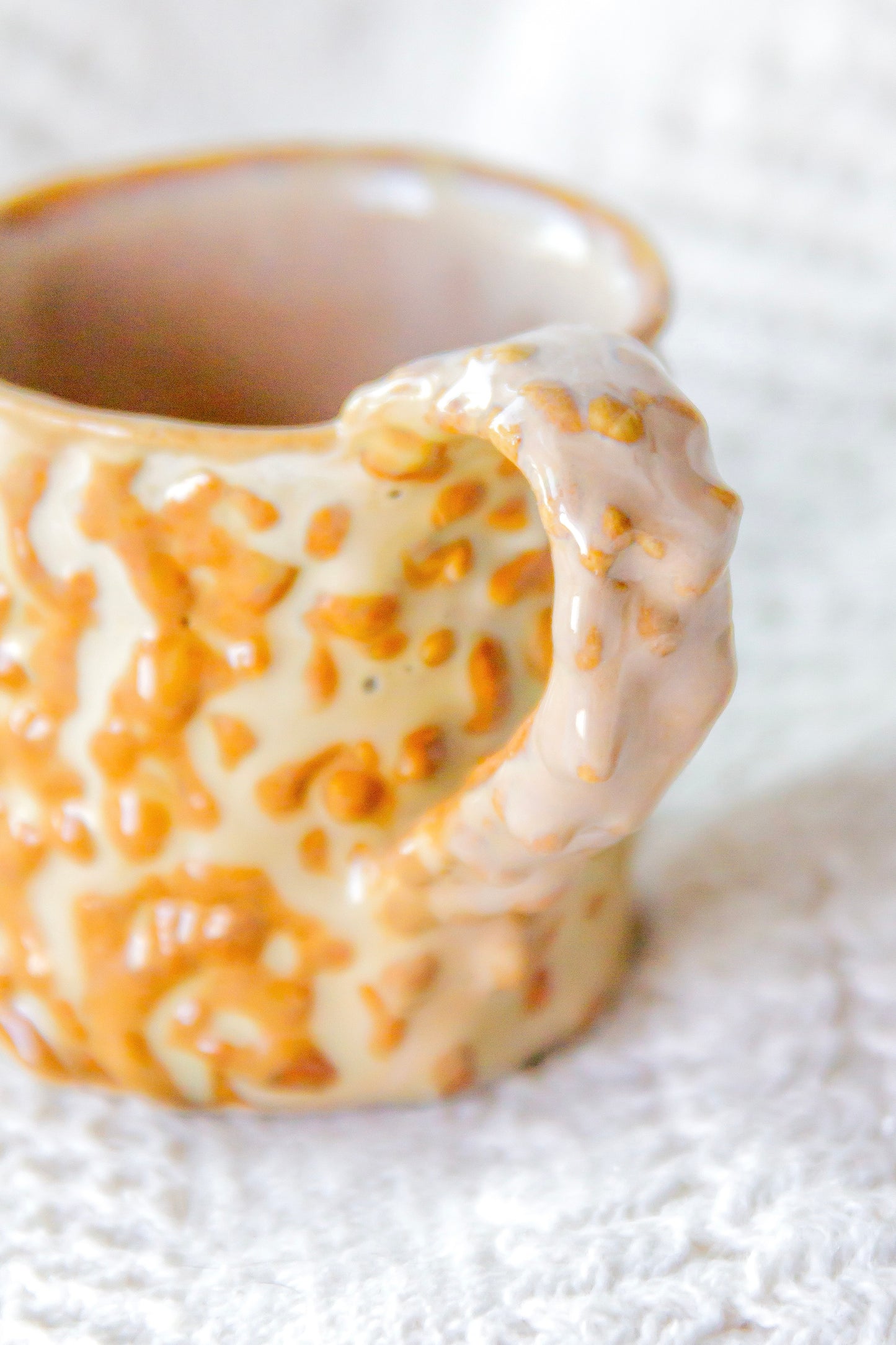 Filiżanka do espresso ceramiczna „Pox” beżowo-brązowa