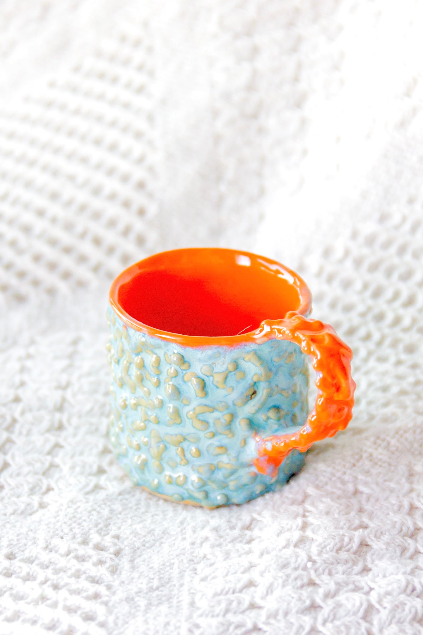 Filiżanka do espresso ceramiczna „Pox” zielono-pomarańczowa