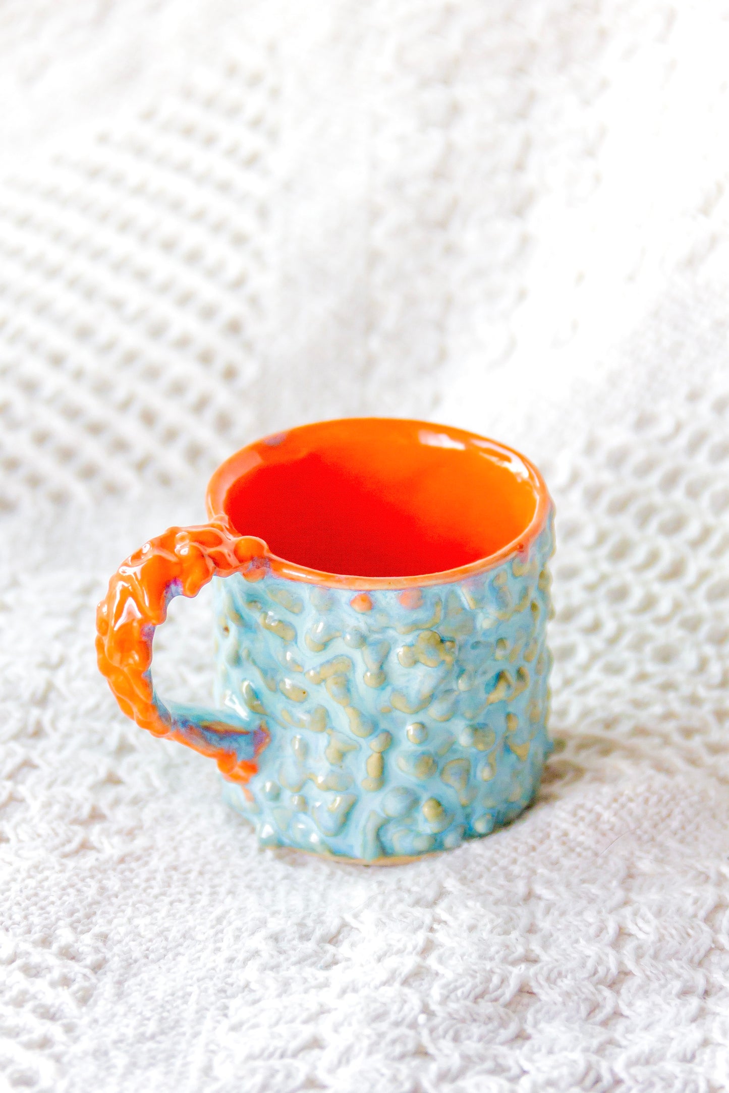 Filiżanka do espresso ceramiczna „Pox” zielono-pomarańczowa