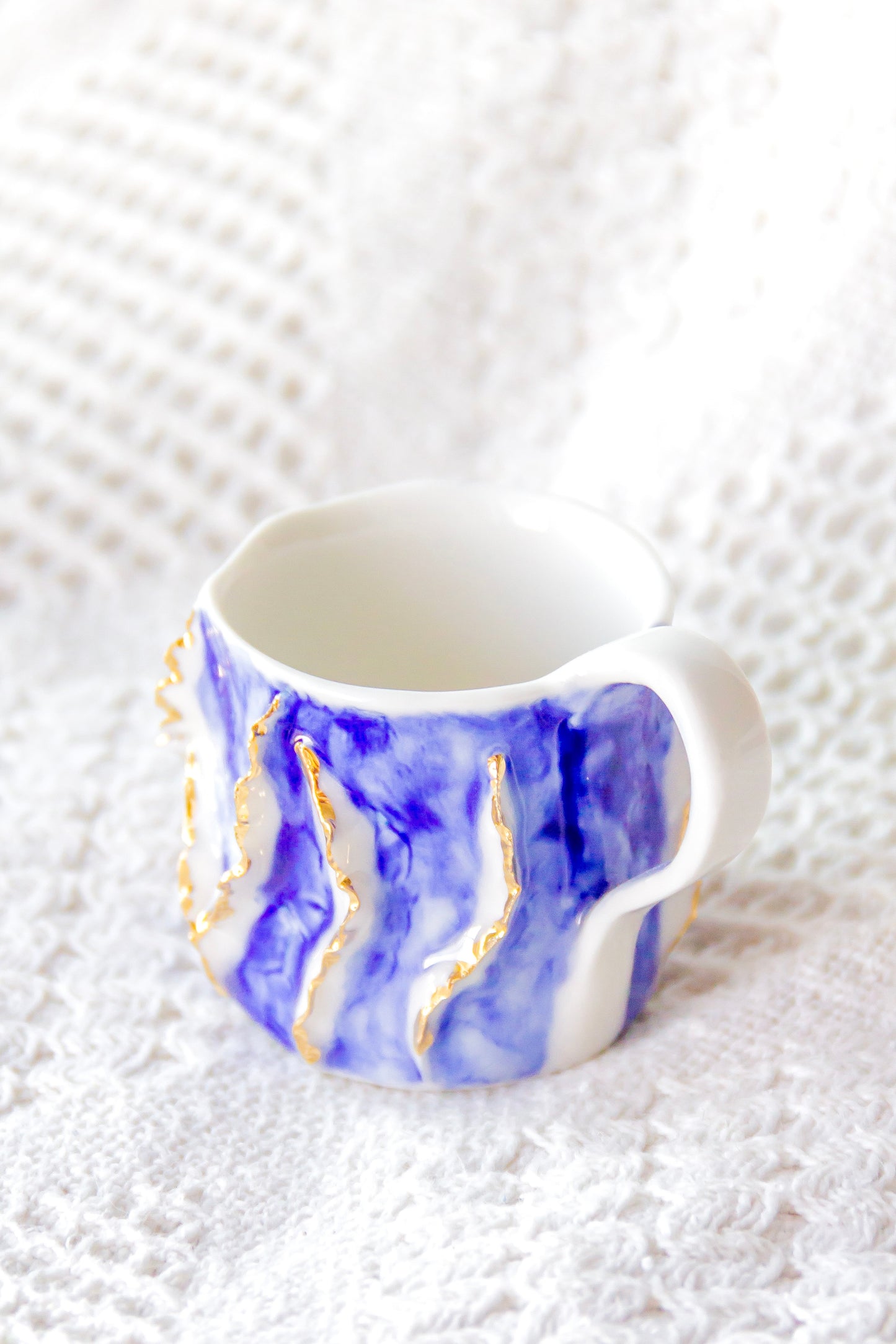 Filiżanka do espresso porcelanowa „Laminari” ze złoceniem