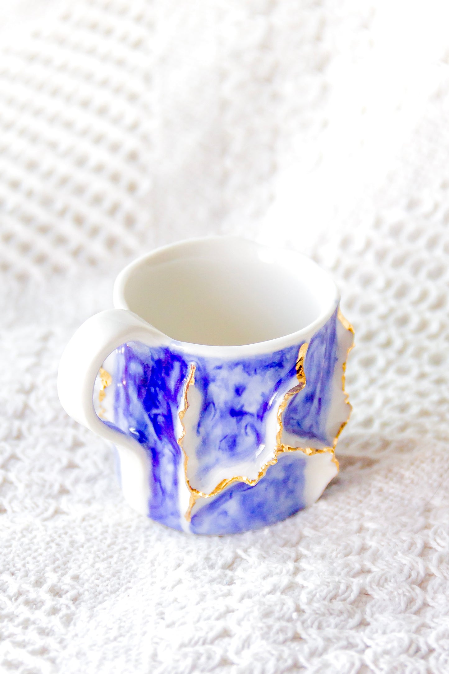 Filiżanka do espresso porcelanowa „Laminari” ze złoceniem