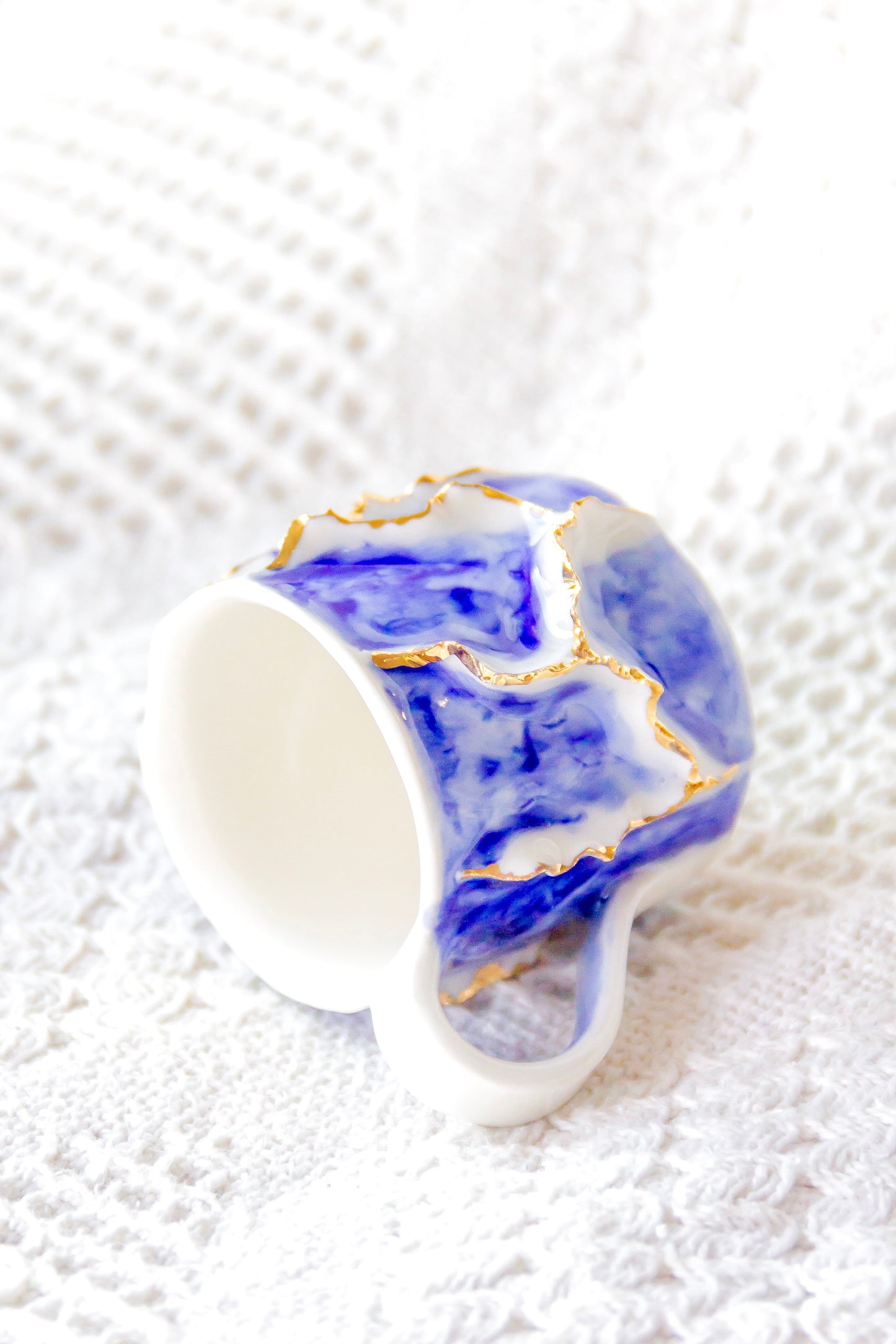 Filiżanka do espresso porcelanowa „Laminari” ze złoceniem
