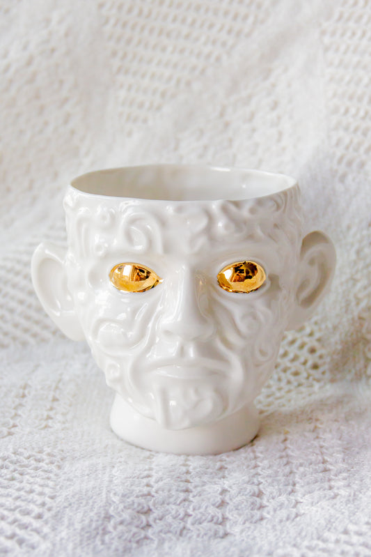 Czarka porcelanowa «Navi» biała ze złoceniem