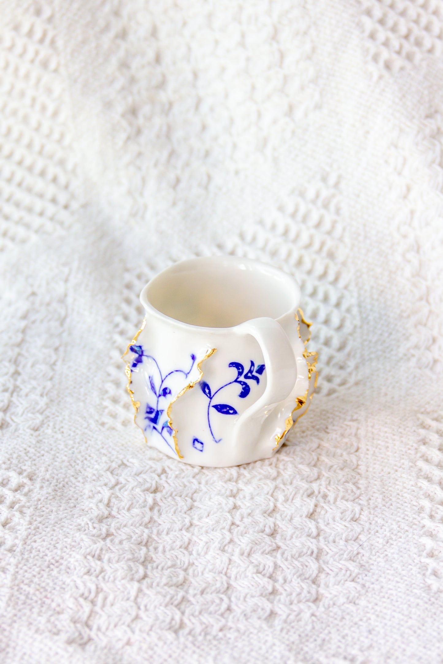 Tasse à expresso en porcelaine "Laminari" dorée