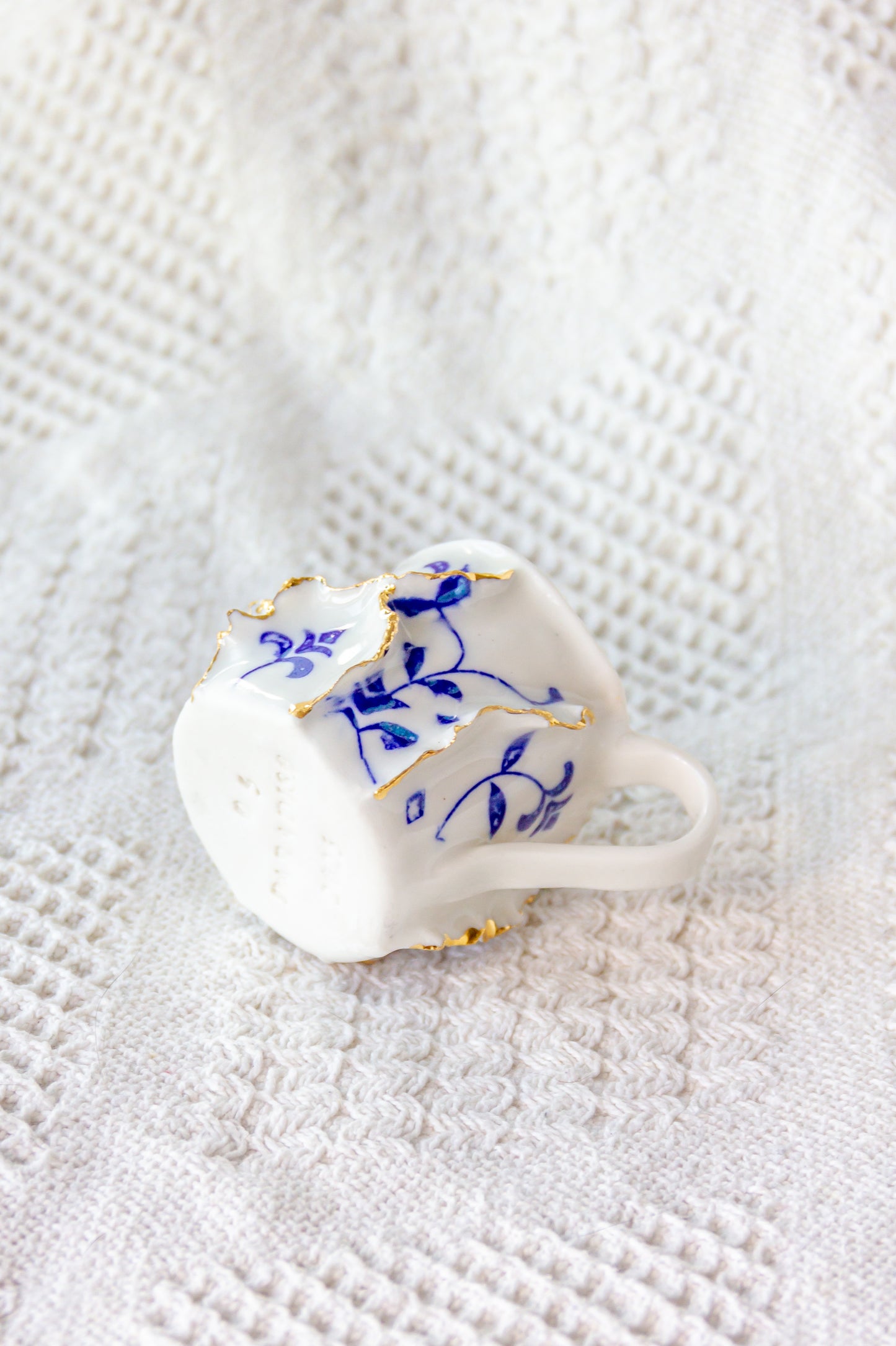 Tasse à expresso en porcelaine "Laminari" dorée