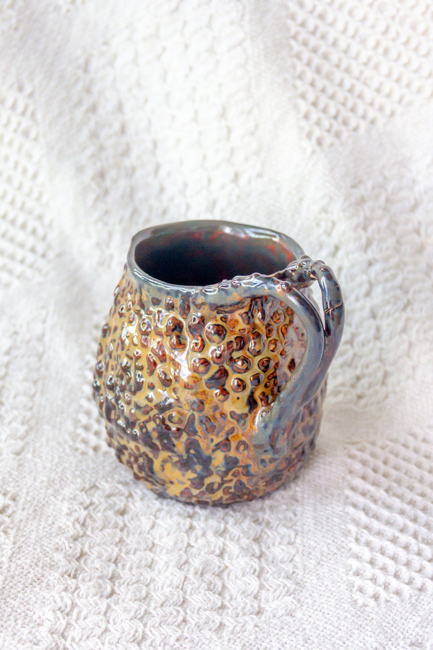 Kubek ceramiczny „Rafflesio” czarno-brązowy