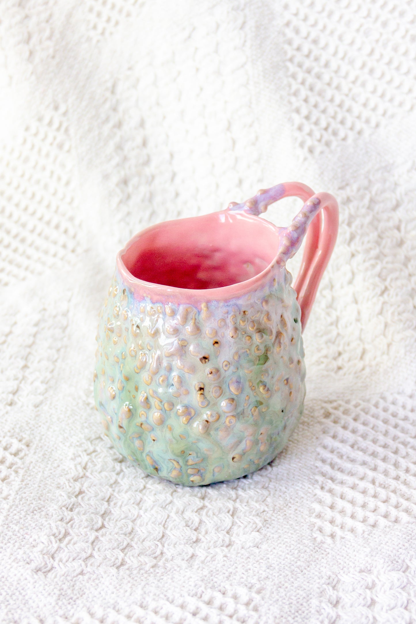 Kubek ceramiczny „Rafflesio” zielono-różowy
