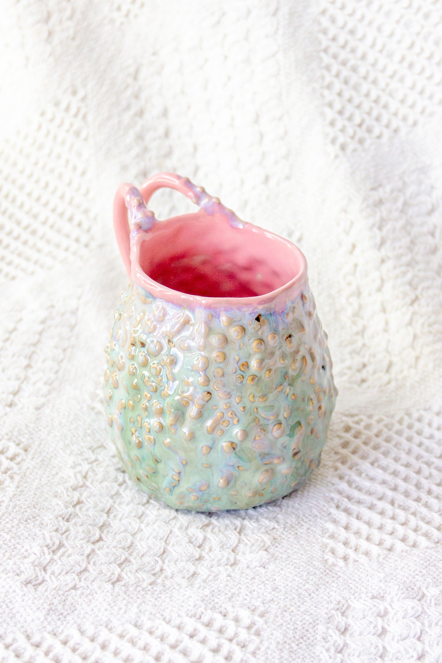 Kubek ceramiczny „Rafflesio” zielono-różowy
