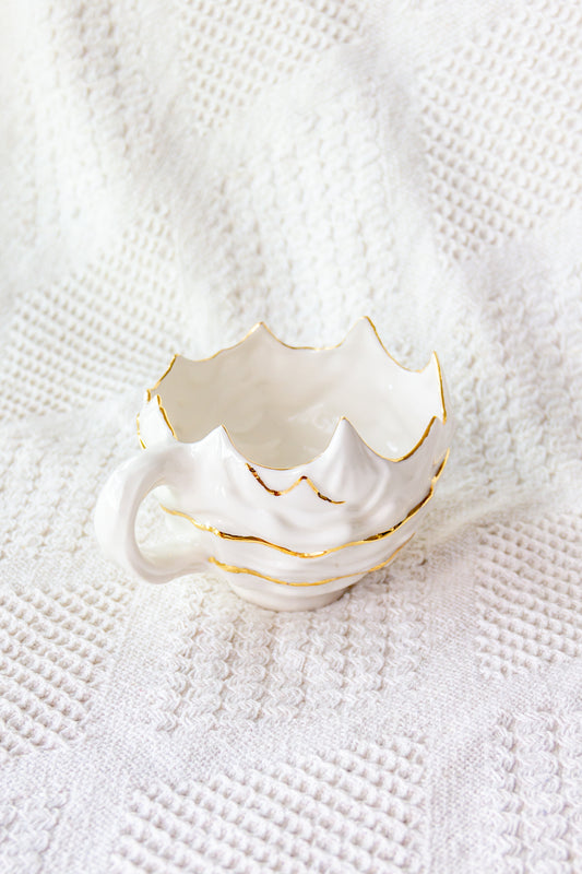 Kubek porcelanowy «Ogri» ze złoceniem