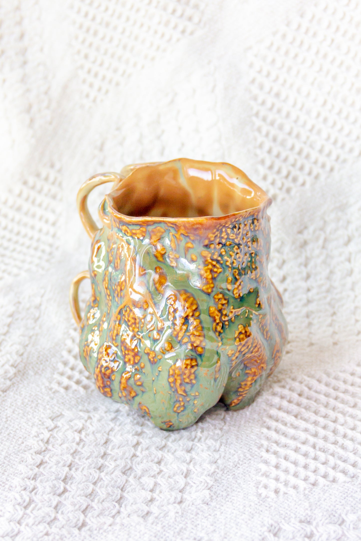 Kubek ceramiczny “Couroupita” brązowo-zielony