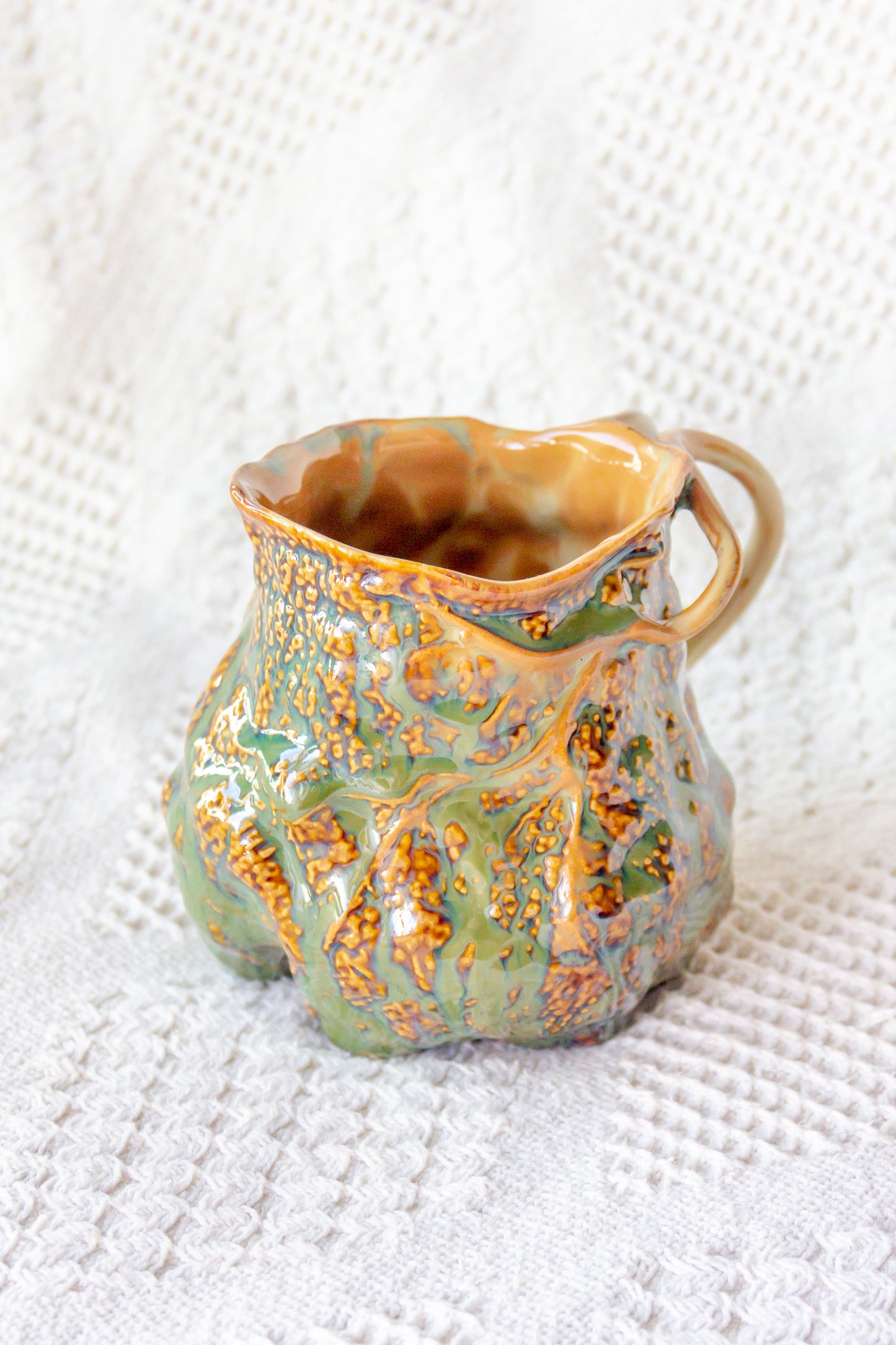Kubek ceramiczny “Couroupita” brązowo-zielony