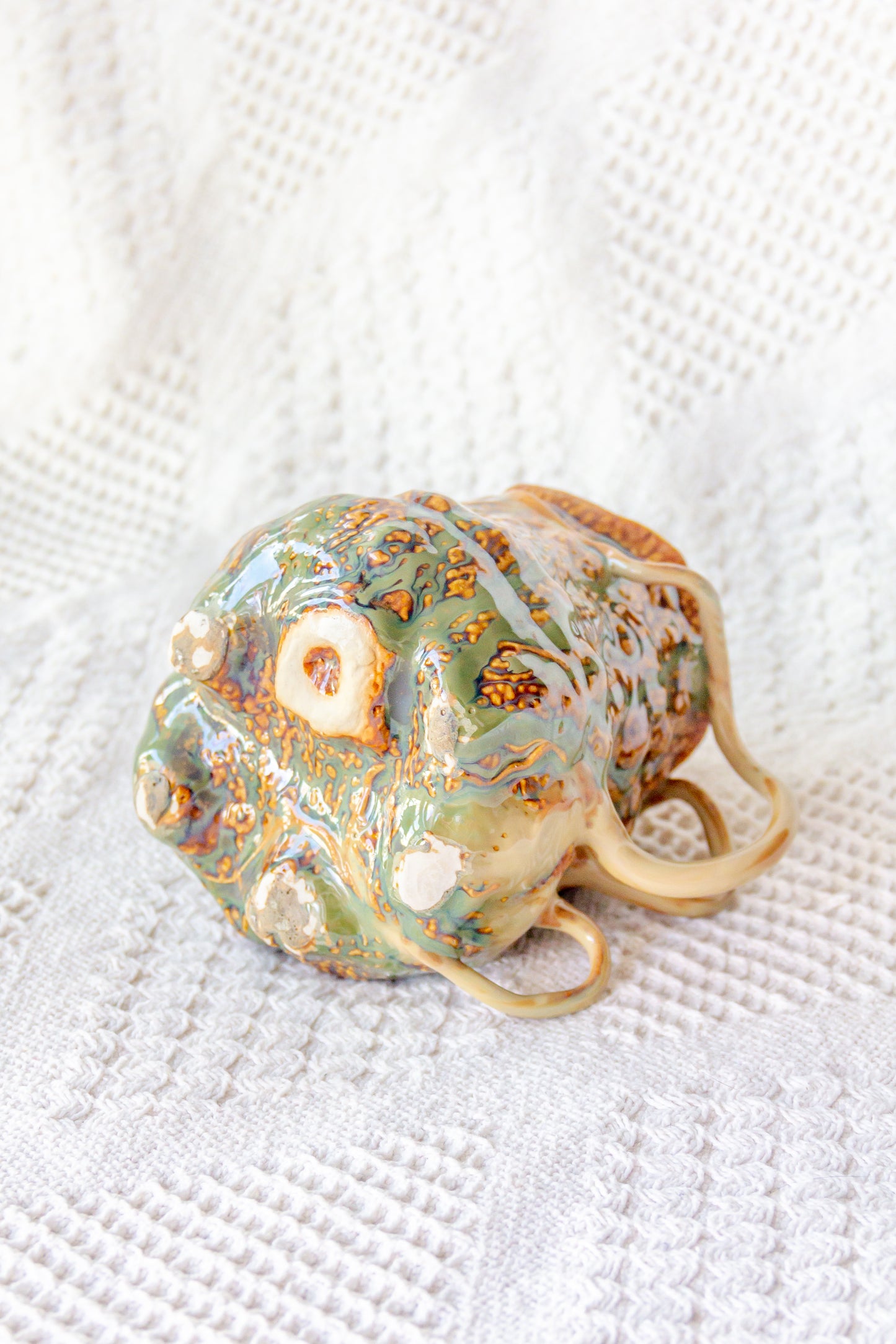 Kubek ceramiczny “Couroupita” brązowo-zielony
