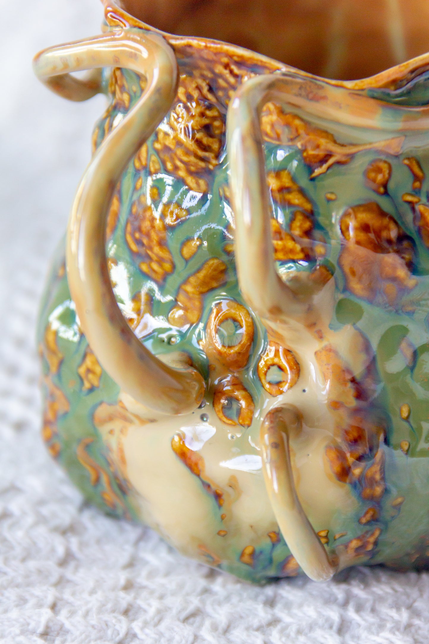 Kubek ceramiczny “Couroupita” brązowo-zielony