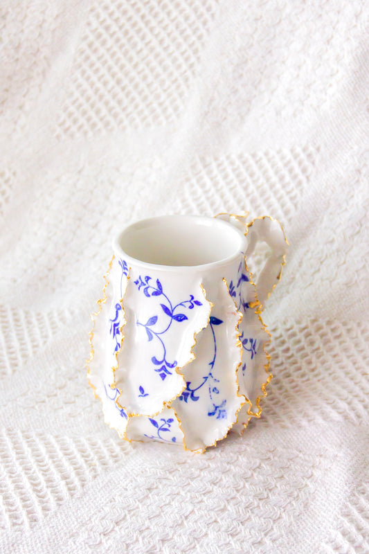 Kubek porcelanowy „Laminari” ze złoceniem