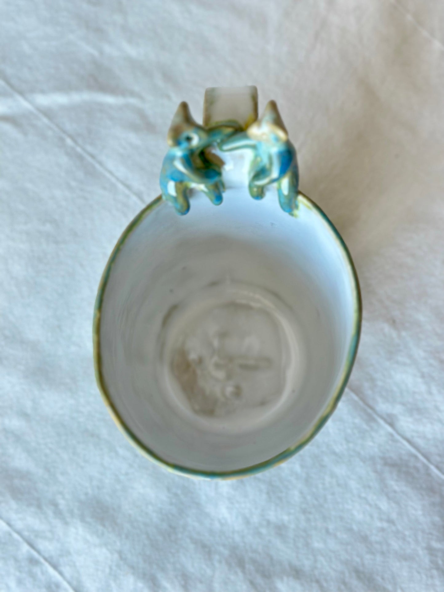 Kubek ceramiczny z werlingami w kolorze zielono-białym