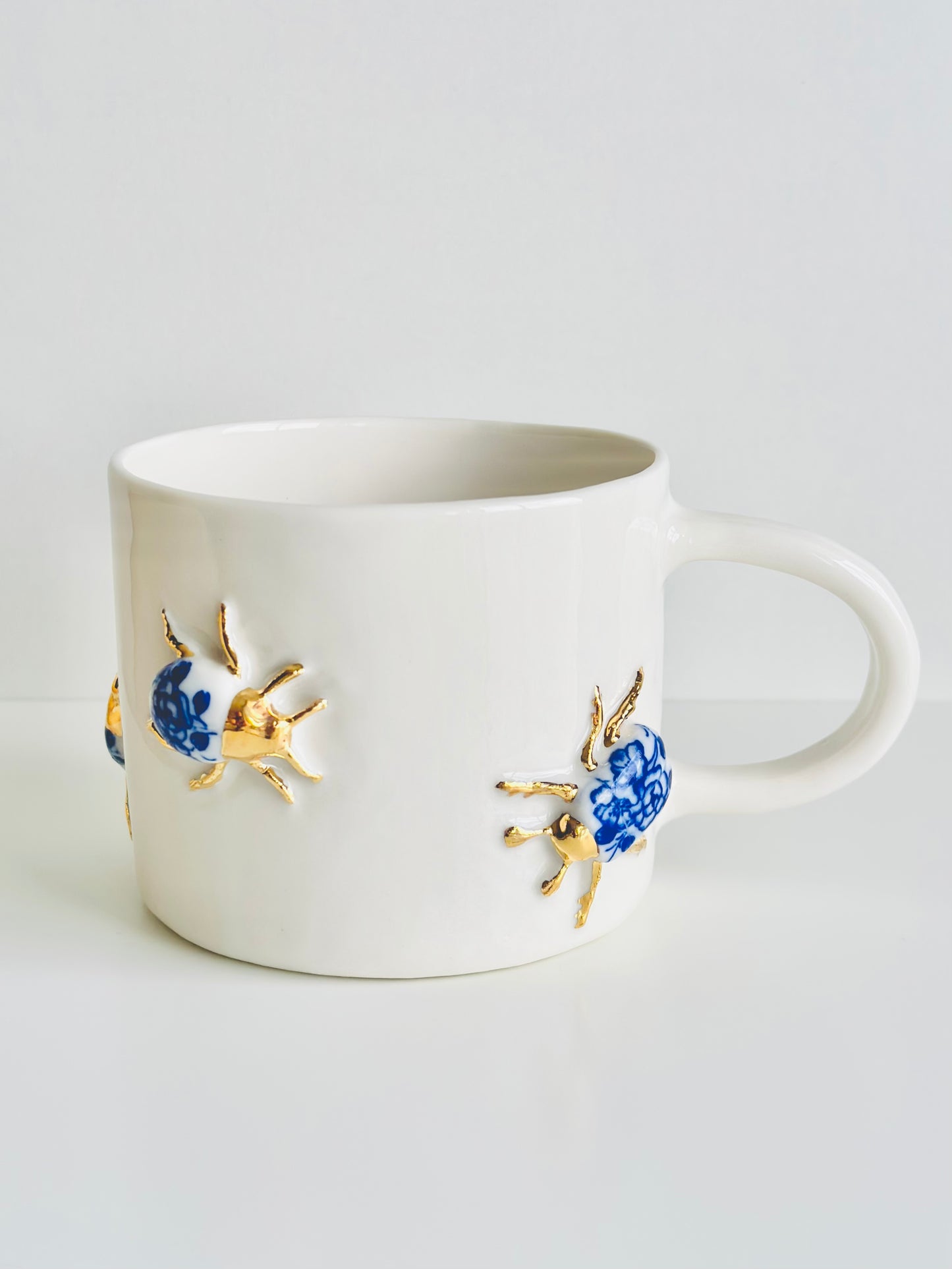Mug en porcelaine plaqué or