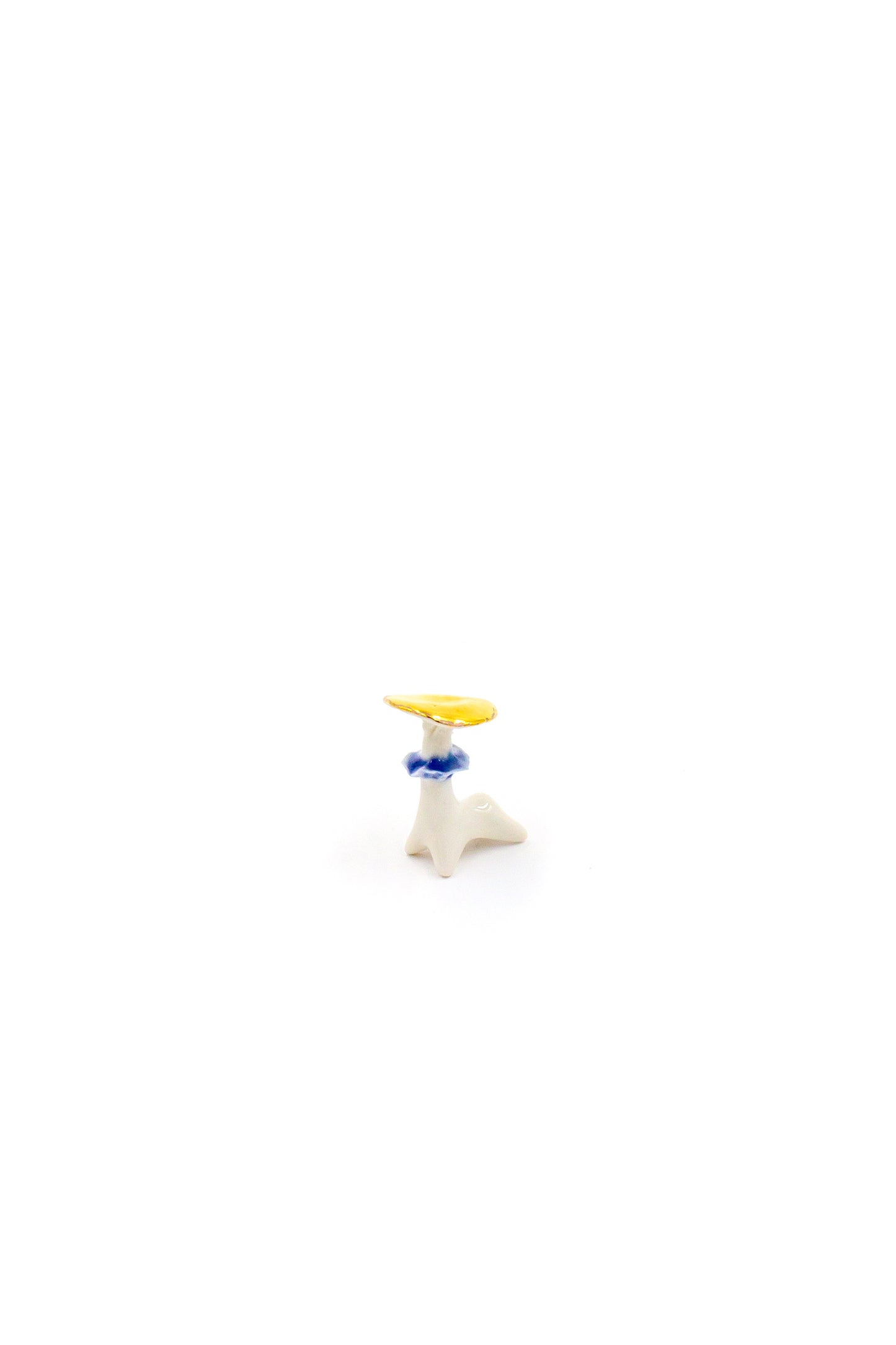 Champignons en porcelaine dorés
