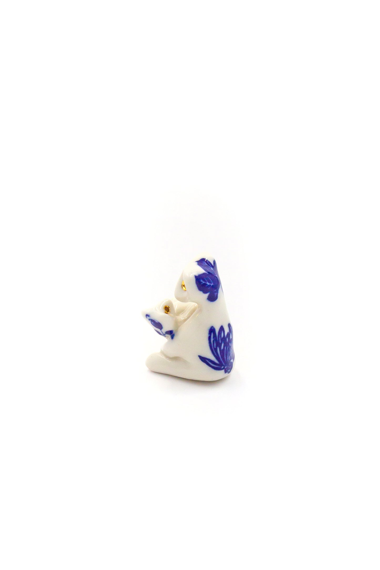 Werlingtin avec un enfant dans les bras, sculpture en porcelaine avec dorure