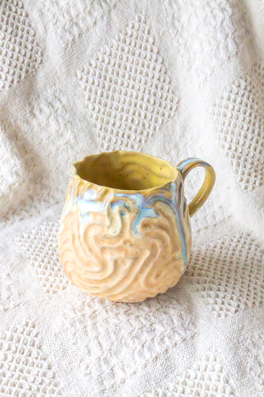 Kubek ceramiczny “Zuma” w kolorze zółto-beżowym