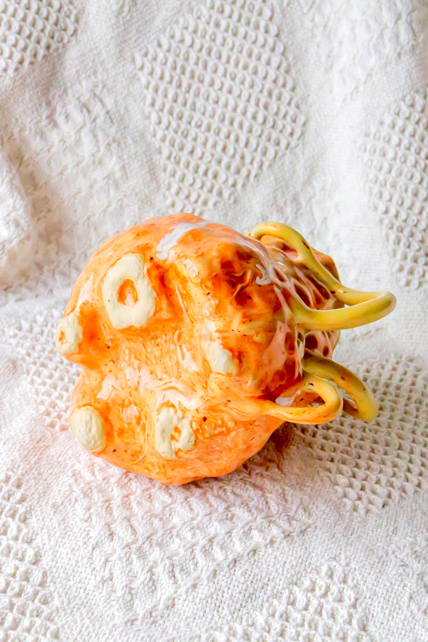 Kubek ceramiczny “Couroupita” w kolorze pomarańczowym