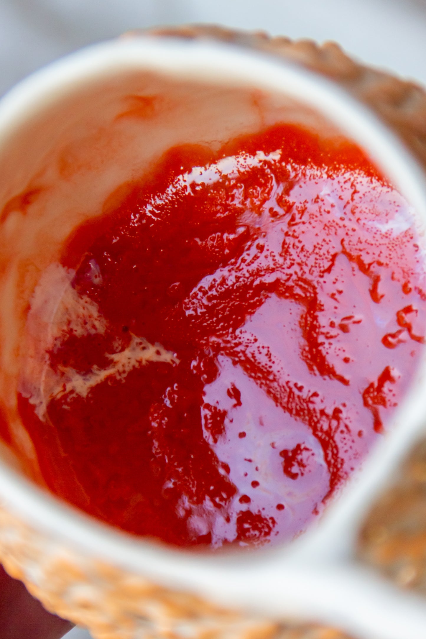 Kubek porcelanowy „Rafflesio” biało-pomarańczowy ze złoceniem