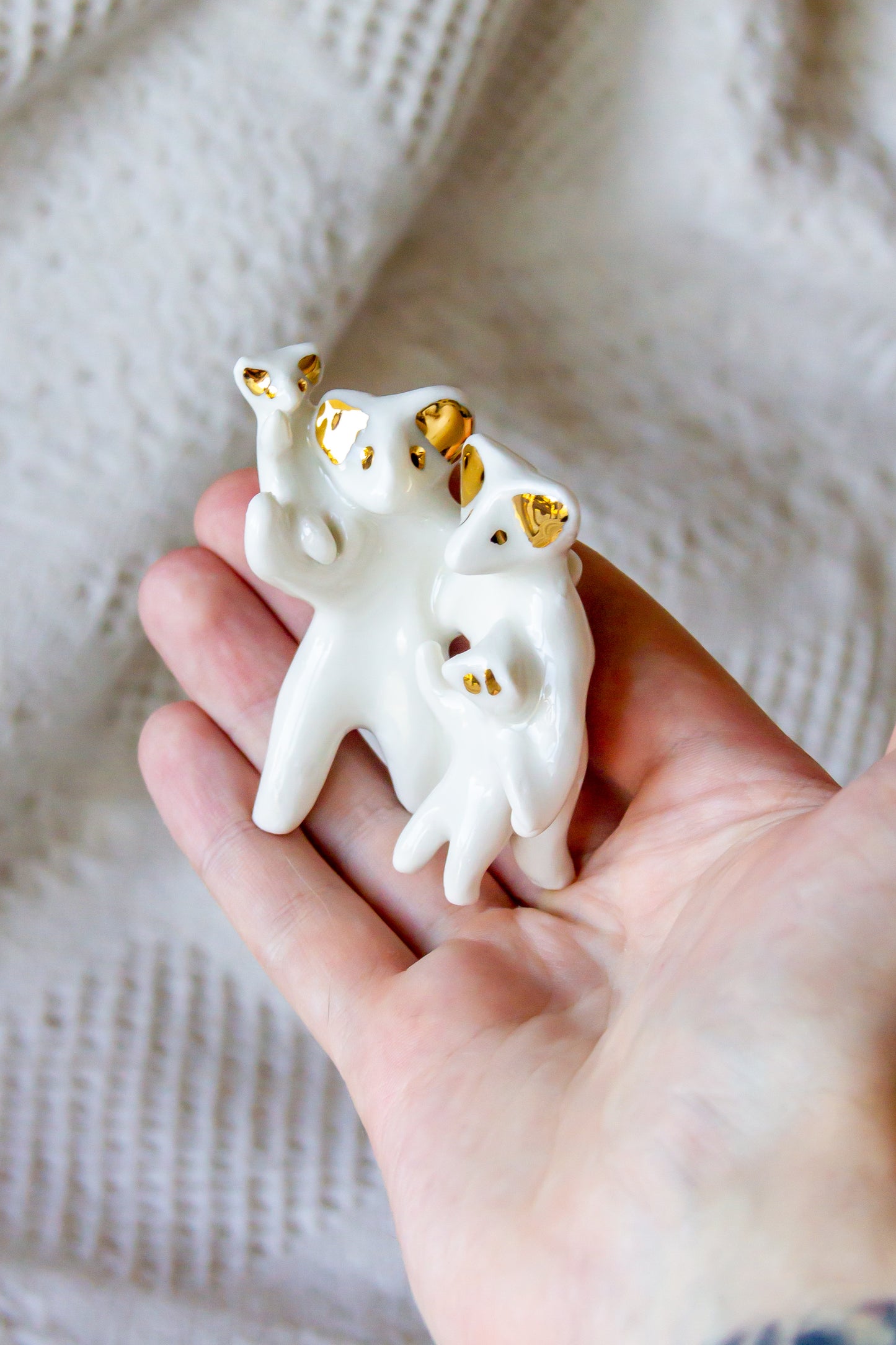 Grande Famille Werling, sculpture en porcelaine avec dorure