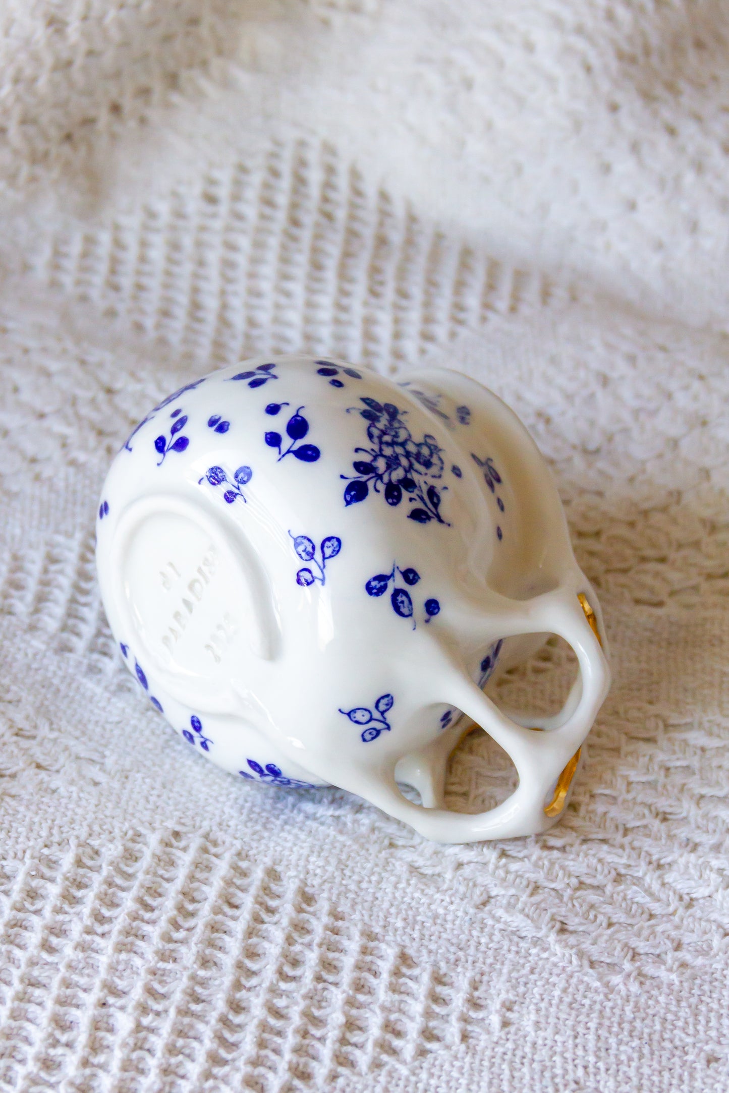 Kubek porcelanowy „Tripto” ze złoceniem