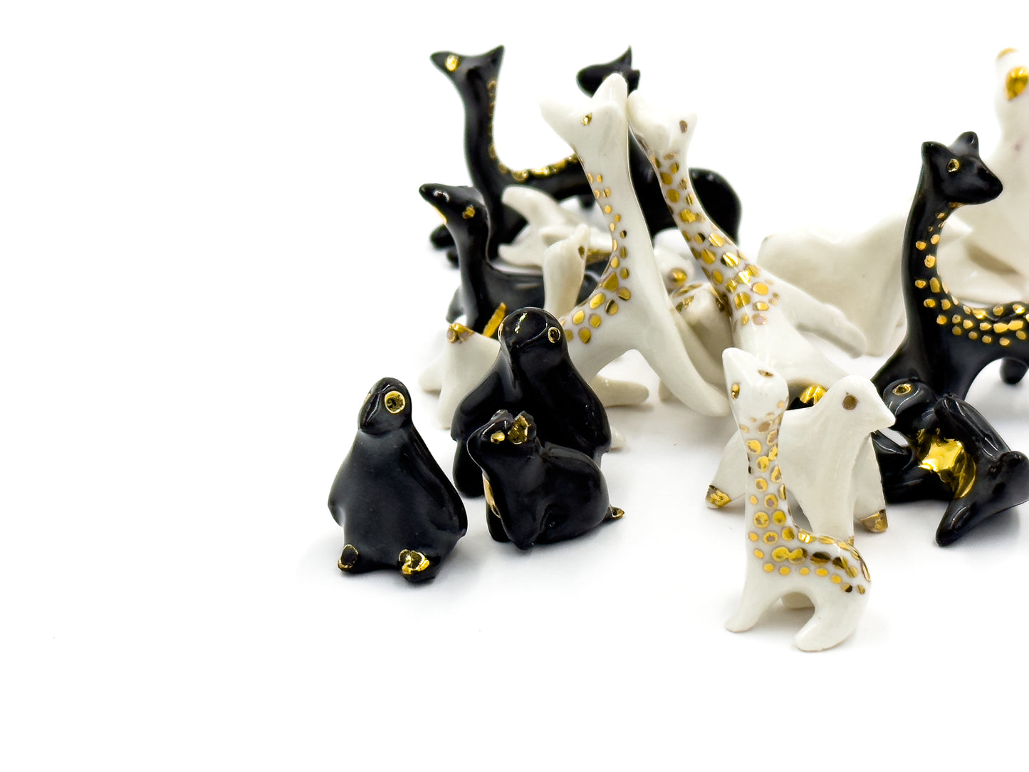 Zwierzęta porcelanowe ze złoceniem