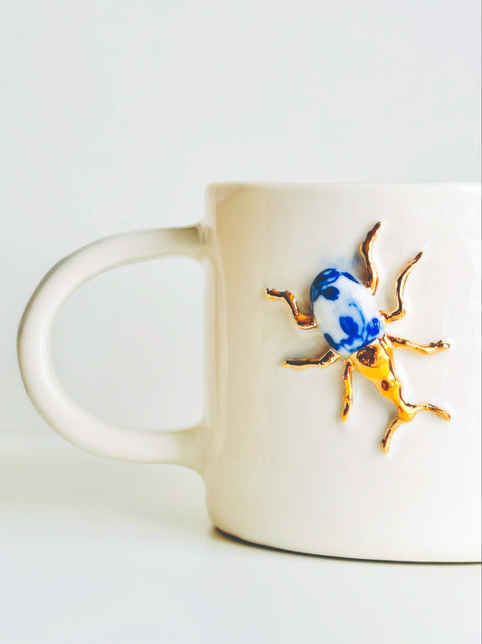 Mug en porcelaine plaqué or