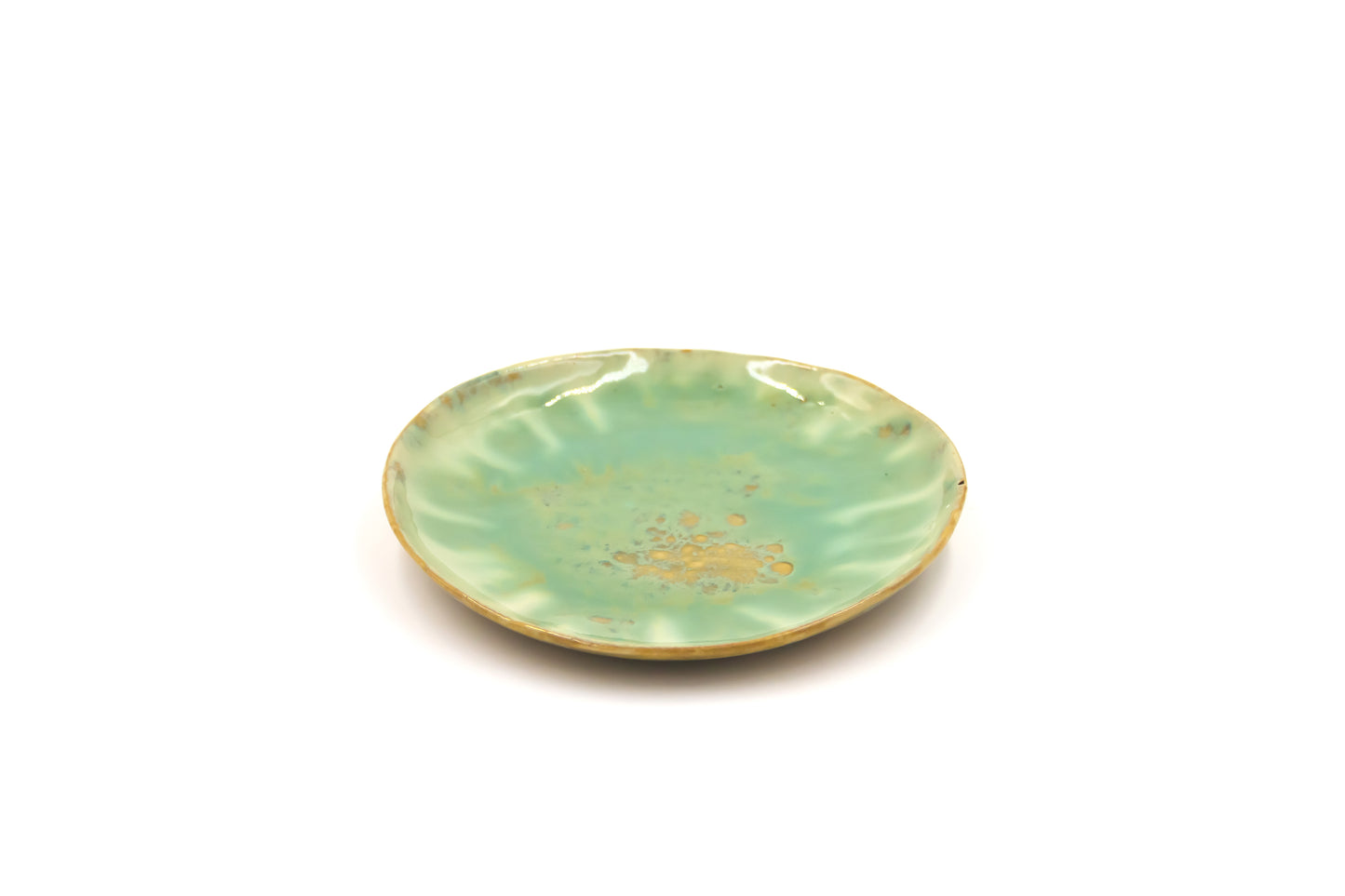 Talerz ceramiczny w kolorze beżowo-zielonym