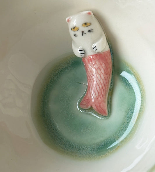 Filiżanka porcelanowa z syrenkotką