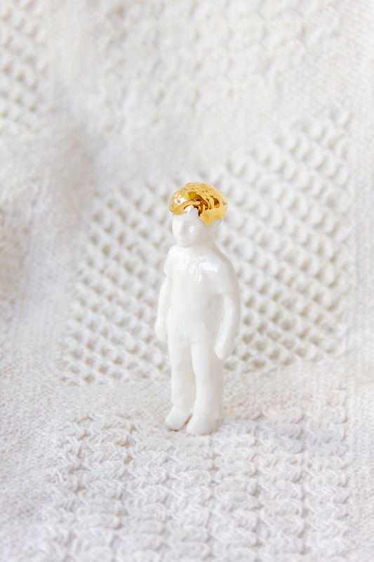 Rzeźba porcelanowa “Frozen Charlotte reborn” ze złoceniem