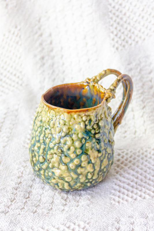 Kubek ceramiczny „Rafflesio” zielono-brązowy