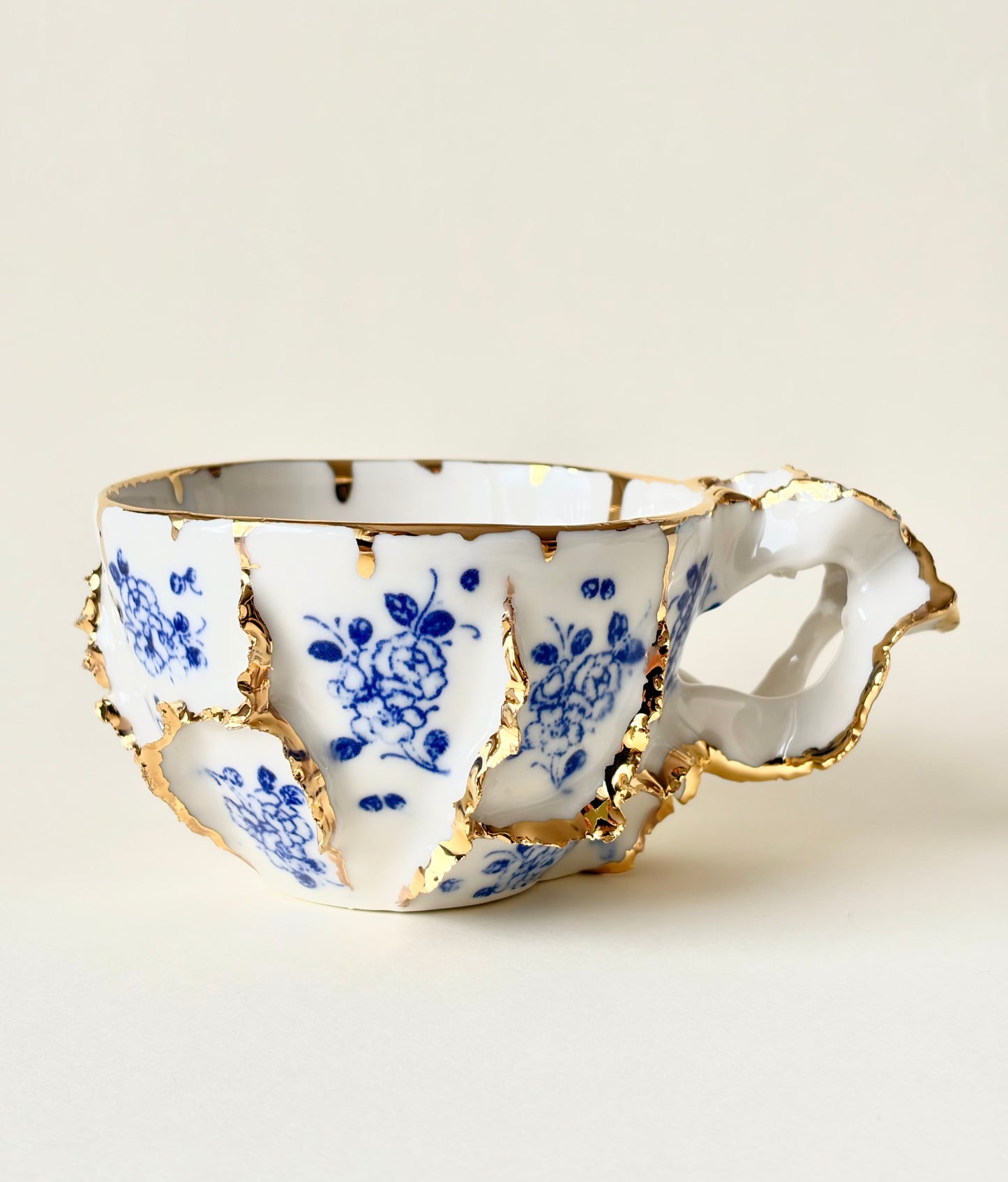 Filiżanka „Laminari” porcelanowa ze złoceniem