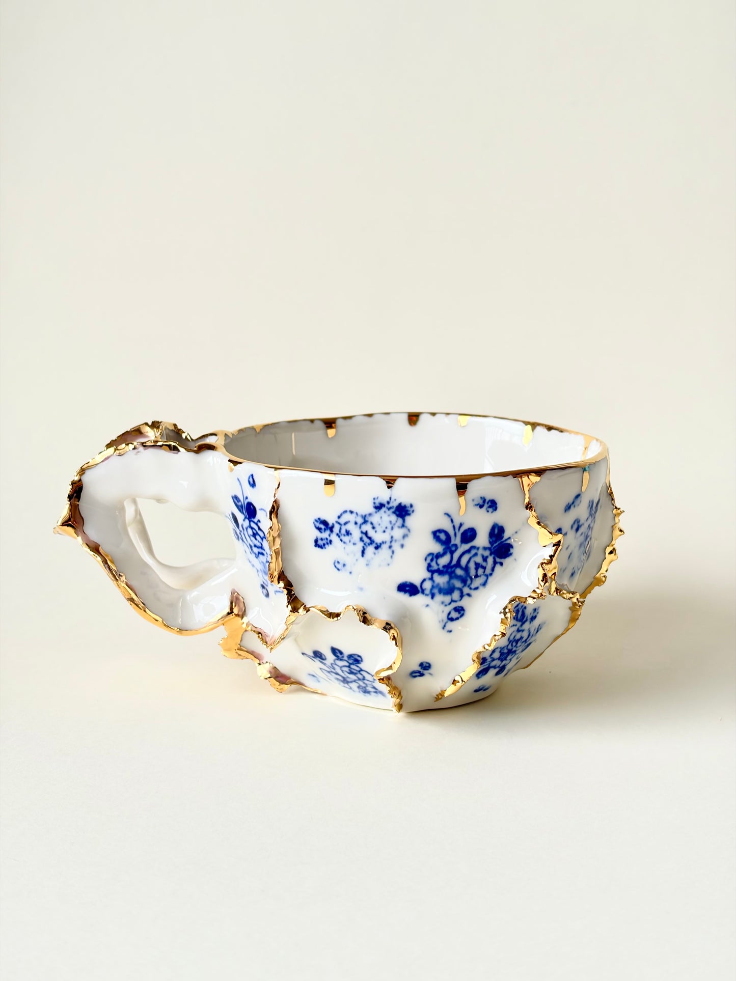 Filiżanka „Laminari” porcelanowa ze złoceniem