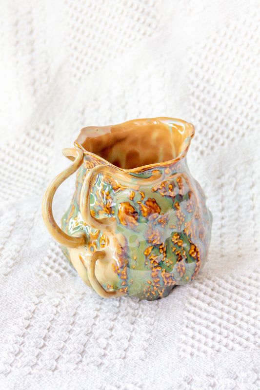 Kubek ceramiczny “Couroupita” brązowo-zielony