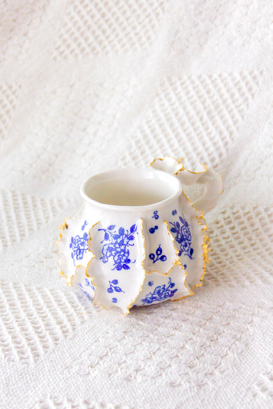 Kubek porcelanowy „Laminari” ze złoceniem