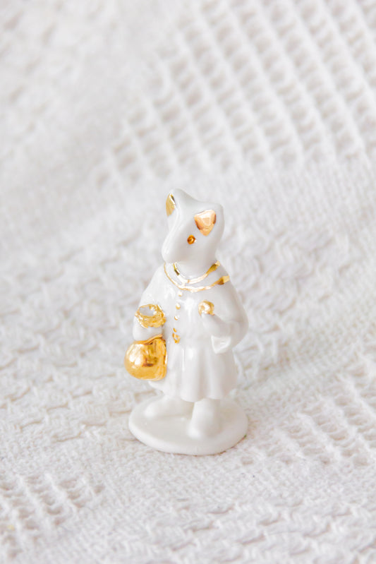 Werling kupiec, rzeźba porcelanowa ze złoceniem